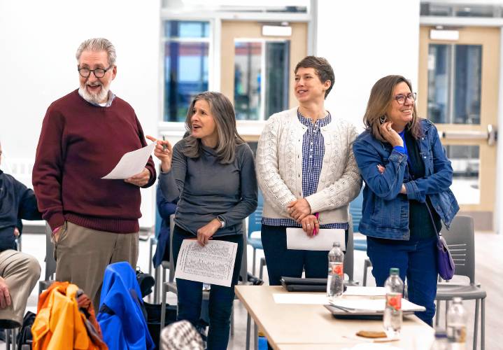 Mayor Byron Champlin, councilors Stacey Brown, Judith Kurtz, and Jennifer Kretovic (all standing) are part of the green group in an exercise of different personality types at the council orientation Wednesday.