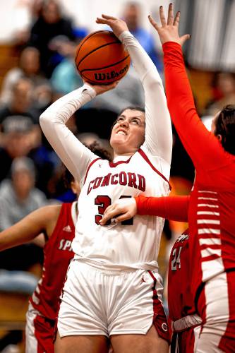 Concord center Sofia Payne goes up strong for a shot during the fourth quarter on Friday night, January 5, 2024.