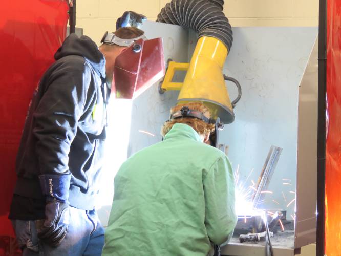  A JSRHS student during the welding demo given by MDS Welding.