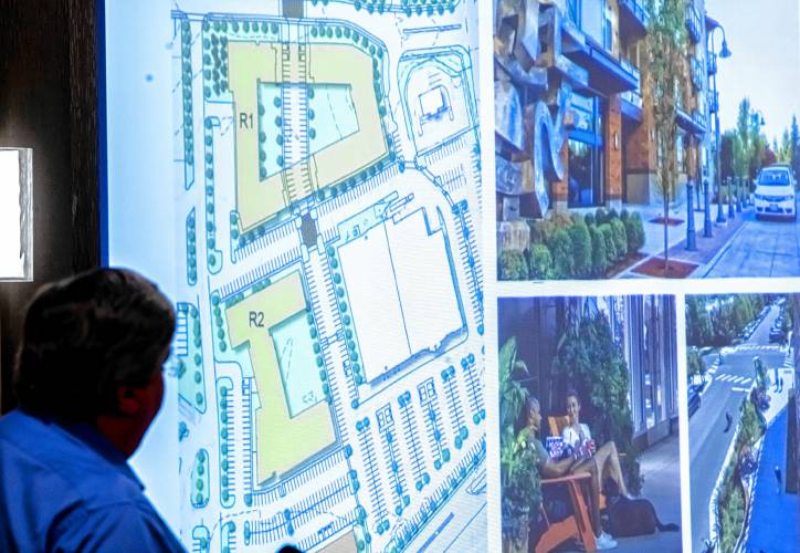 Doug Richardson, executive vice president of Onyx Partners, show a rendition of the plans for the Steeplegate Mall along with drawing of what the residential buildings would look like on the site at the Greater Concord Chamber of Commerce luncheon presentation of both the Steeplegate and Monitor Way projects on Thursday, January 11, 2024 at the Holiday Inn in downtown Concord.