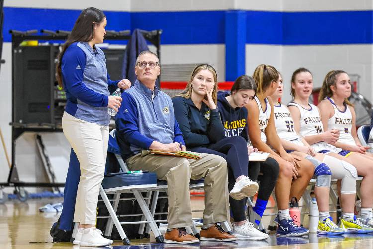 Cassidy Emerson talks to her father and assistant coach, Dale Emerson, during Bow's game against Kingswood on Jan. 5.