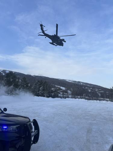 New Hampshire Army National Guard members attempt a helicopter extraction of the hiker.