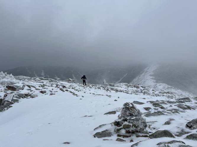New Hampshire Army National Guard members attempt a helicopter extraction of the hiker.