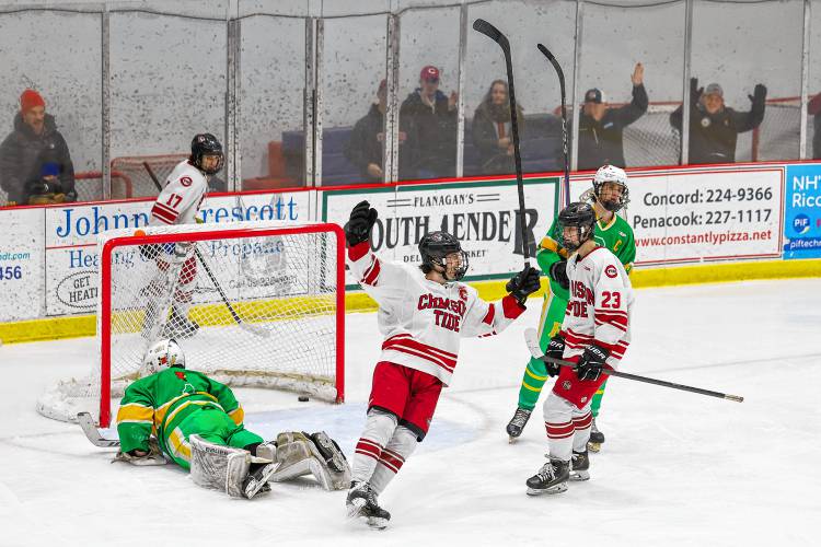Concord’s Dawson Fancher (10) scores against Bishop Guertin on Saturday at Everett Arena. Fancher had two goals and two assists to lead the Crimson Tide to a 5-1 victory.