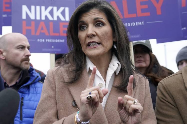 Republican presidential candidate former U.N. Ambassador Nikki Haley addresses members of the media, Tuesday, Jan. 23, 2024, near a polling site at Winnacunnet High School, in Hampton, N.H. (AP Photo/Steven Senne)