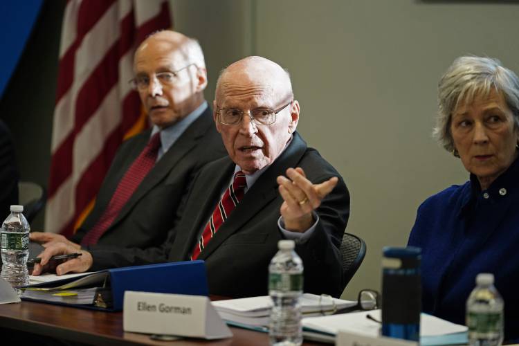 Former Chief Justice Daniel Wathen, chair of an independent commission investigating the law enforcement response to the mass shooting in Lewiston, Maine, speaks at a hearing Thursday, Jan. 25, 2024, in Augusta, Maine. The commission is working to resolve questions from a tragedy that killed 18 people and injured more than a dozen others. (AP Photo/Robert F. Bukaty)