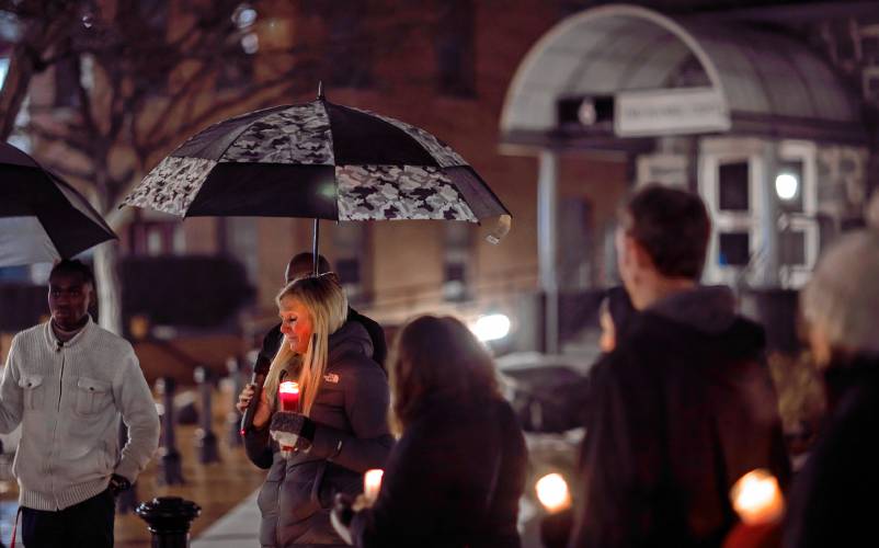 Zackary Sullivan’s mother, Audrey Moran (left), spoke at the vigil in his honor on Friday night at Eagle Square.