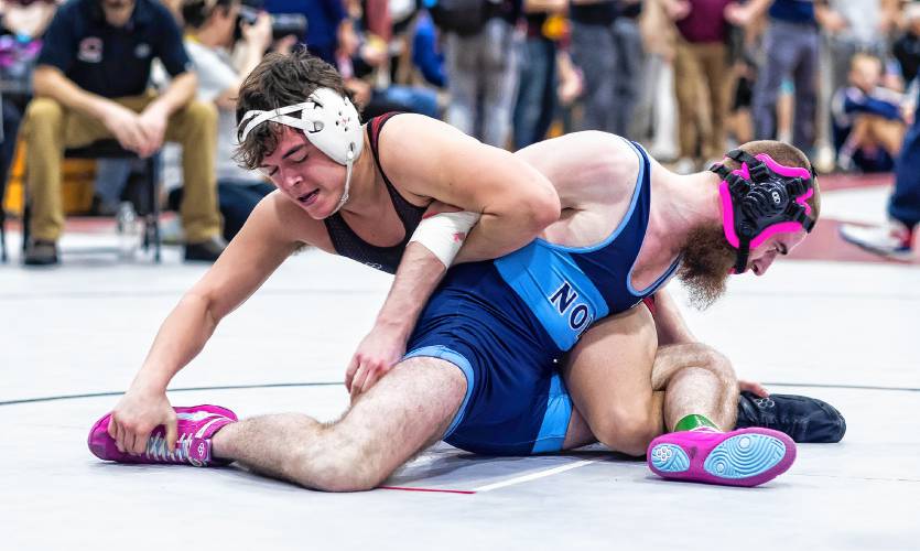 Concord 138-pound wrestler Sawyer McCready (left) takes control of his match against Trevor Rivard of Nashua North at the Concord Classic on Saturday. McCready won the match and finished sixth in the 138 bracket.