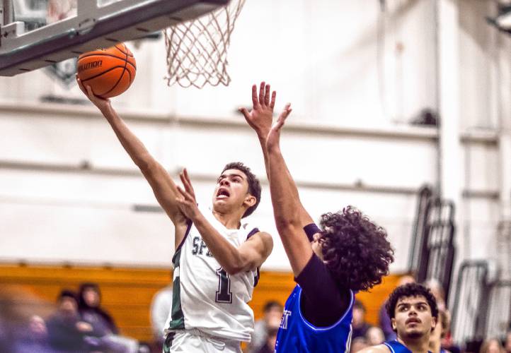 Pembroke guard Evan Berkeley scores at the rim during the second half against Manchester West on Tuesday night, January 30, 2024.