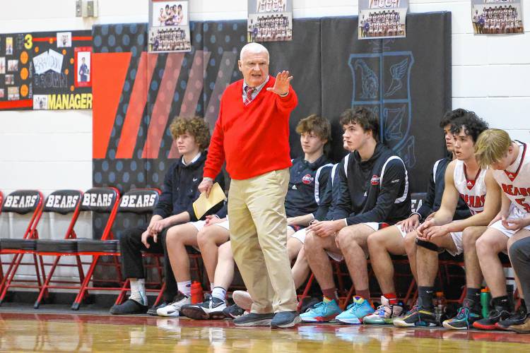 Dave Smith coaching Coe-Brown during last year’s Division II first round playoff game against Bow. Smith started coaching in 1967. He’s now in his 33rd season as the varsity boys’ basketball coach at CBNA.