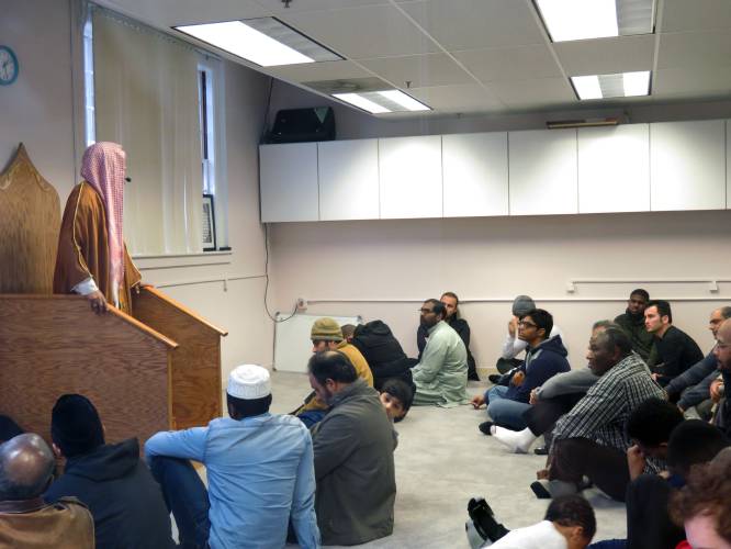 The imam speaks to worshipers at the Concord Islamic Society’s mosque shortly after it opened on Main Street in 2018.