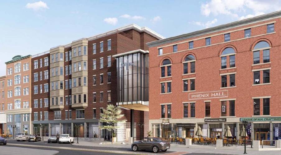 A rendering of a proposed mixed-use building to replace the closed CVS on North Main Street, with a glass-fronted connection to Phenix Hall.