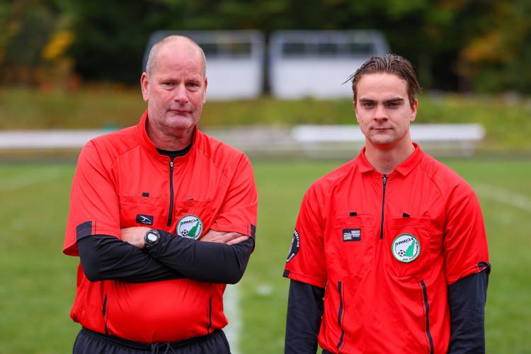 Gabe Anthony (right) with his father Rick before the two officiated a boys' soccer game between Bow and John Stark on Oct. 1, 2022. Dec. 20, 2023.