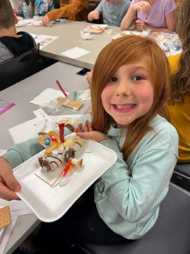 Students work on activities at the Aviation Museum of N.H.