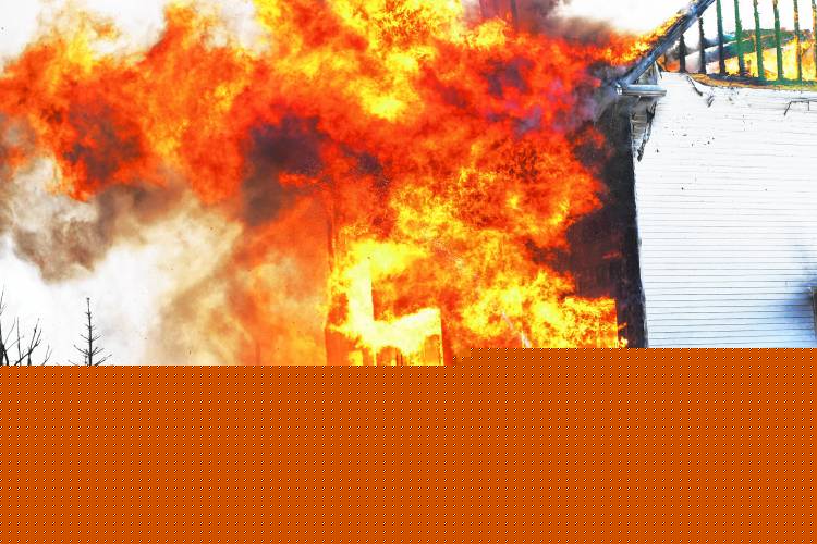 A fire that began in the garage quickly spread to the entirety of a four-bedroom home on Barton Corner Road in Hopkinton on Wednesday. A woman and two dogs were able to evacuate, according to Hopkinton Fire Department, but the home was destroyed.