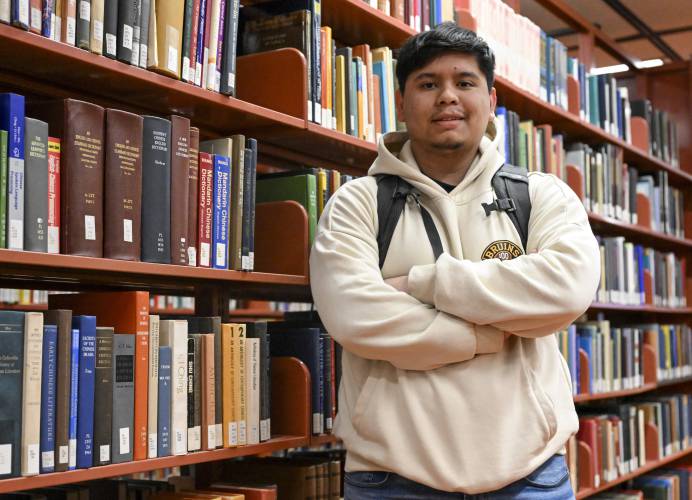 Jesus Noyola, a sophomore attending Rensselaer Polytechnic Institute, poses for a portrait in the Folsom Library, Tuesday, Feb. 13, 2024, in Troy, N.Y. A later-than-expected rollout of a revised Free Application for Federal Student Aid, or FASFA, that schools use to compute financial aid, is resulting in students and their parents putting off college decisions. Noyola said he hasn’t been able to submit his FAFSA because of an error in the parent portion of the application. “It’s...