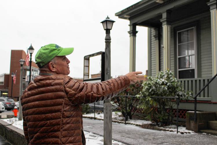 Concord developer Steve Duprey points while discussing  the  Norris Mansion in 2023. Built in 1860, the Main Street structure is one of the only intact historic buildings remaining in the city of Concord.