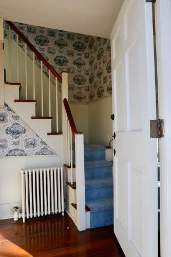 The staircase is the first thing you see when you walk into the house.