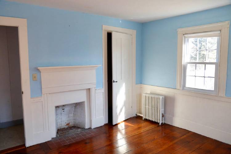  One of the five fireplaces.