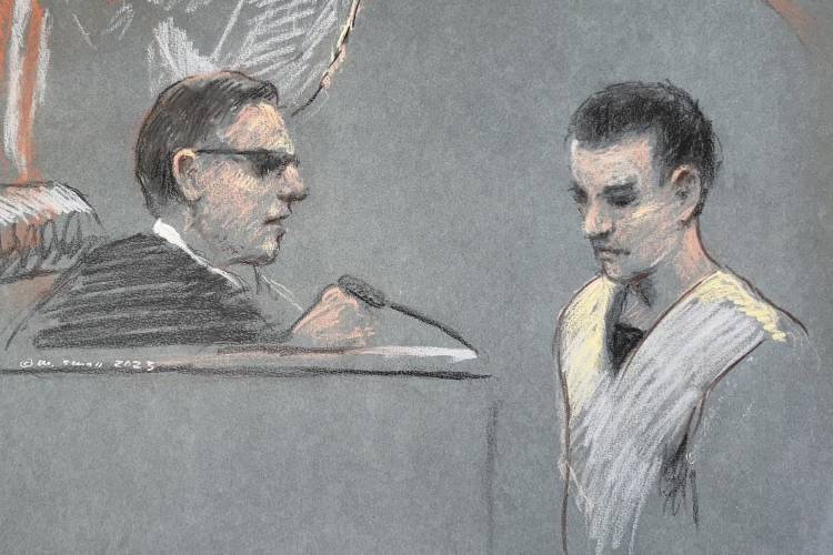 FILE - This artist depiction shows Massachusetts Air National Guardsman Jack Teixeira, right, appearing in U.S. District Court in Boston, April 14, 2023. Teixeira has pleaded guilty in federal court to leaking highly classified military documents about Russia’s war in Ukraine and other national security secrets. Teixeira pleaded guilty in Boston’s federal court on Monday to six counts of willful retention and transmission of national defense information under the Espionage Act....