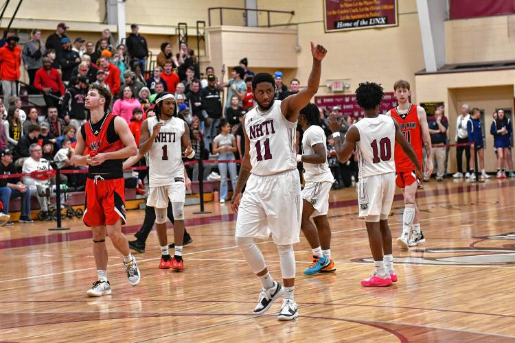 The NHTI men's basketball team won a conference title on its home court this weekend. Cindy A Lavigne photo.