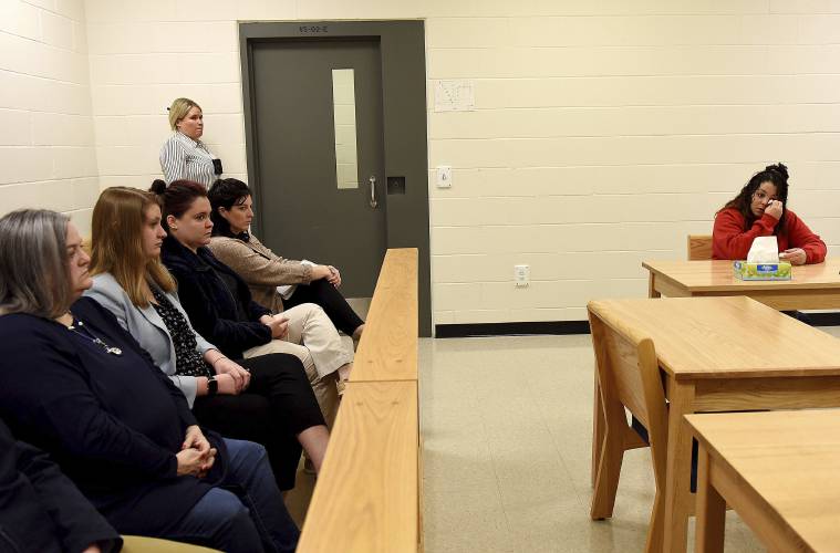 Kayla Montgomery gets emotional during questions from the parole board at the New Hampshire Correctional Facility for Women in Concord, N.H., on Thursday, March 7, 2024. Kayla Montgomery, the estranged wife of Adam Montgomery, convicted of killing his 5-year-old daughter and moving the body around for months, has been granted parole more than a year after she was sentenced to prison for lying about where she was when the child was last seen. (David Lane/Union Leader via AP, Pool)