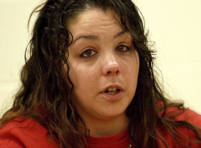 Kayla Montgomery speaks during questioning from the parole board at the New Hampshire Correctional Facility for Women in Concord, N.H., on Thursday, March 7, 2024. Kayla Montgomery, the estranged wife of Adam Montgomery, convicted of killing his 5-year-old daughter and moving the body around for months, has been granted parole more than a year after she was sentenced to prison for lying about where she was when the child was last seen. (David Lane/Union Leader via AP, Pool)