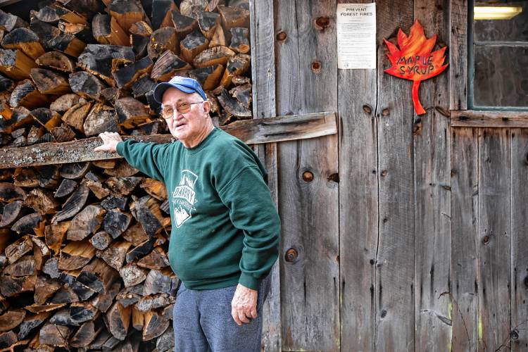 Jerry Courser outside the sugar house that he and his brother, Tim built nearly 50 years ago on Schoodac Road in Warner.