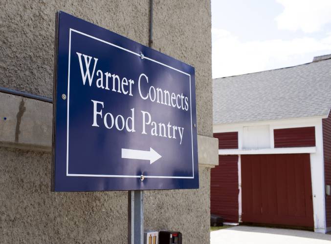 The sign for the Warner Connects Food Pantry at the Community Center in downtown Warner.