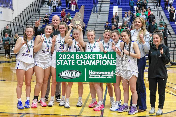 Concord Christian celebrates winning the 2024 Division II girls’ basketball championship at the University of New Hampshire on Sunday.