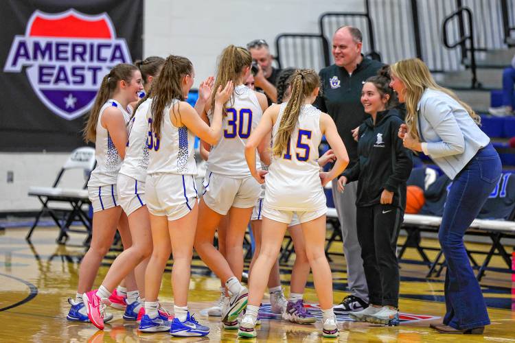 Concord Christian celebrates winning the 2024 Division II girls’ basketball championship at the University of New Hampshire on Sunday.