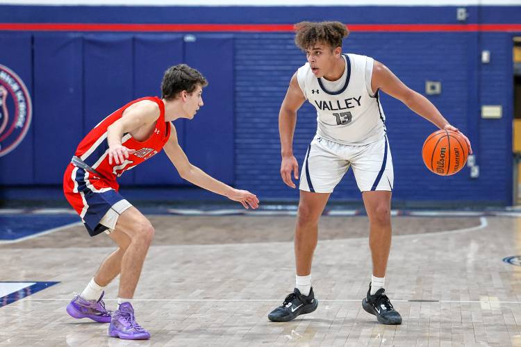 MV's Trevor Simonds dribbles the ball against John Stark.