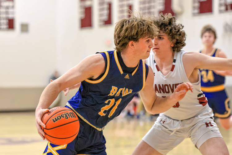 Peyton Larrabee drives toward the basket in Bow’s D-II quarterfinal loss to Hanover on March 1. Larrabee is among three young forwards expected to bolster the Falcons’ roster in 2024-25.