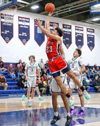 John Stark's Donnie White rises for a shot attempt in a game against Merrimack Valley in mid January.