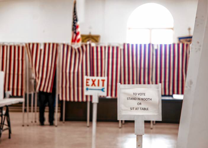 People vote at the Allenstown voting area at the St. John’s Parish Hall on Tuesday, March 12, 2024.