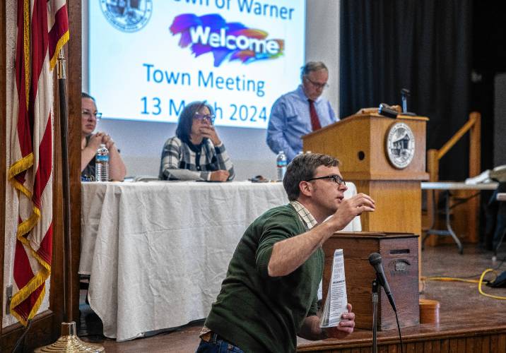 Ian Rogers of the Warner housing advisory committee urges residents to take the survey the committee put together at the start of the town meeting on Wednesday night, March 13, 2024.