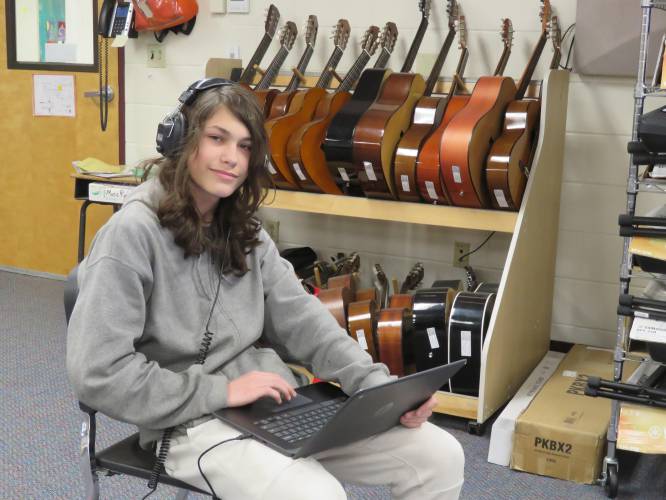 Eighth-grade student Bradley Cooney in the music room at the Henniker Community School. His original composition Outta Time has won the middle school NH Music Educators Association Composition Competition for electronic music. Bradley's work was composed using a Chromebook.