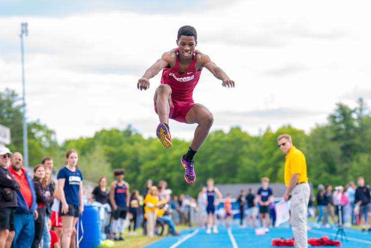 Concord junior Alain Twite takes flight in the triple jump at the NHIAA Division I track and field championship at Salem High School last May. Twite won the triple jump with a leap of 42 feet, 11.5 inches, over a foot and half longer than the runner-up. Twite was the only boys' champion for Concord as the Tide finished 12th as a team in D-I.
